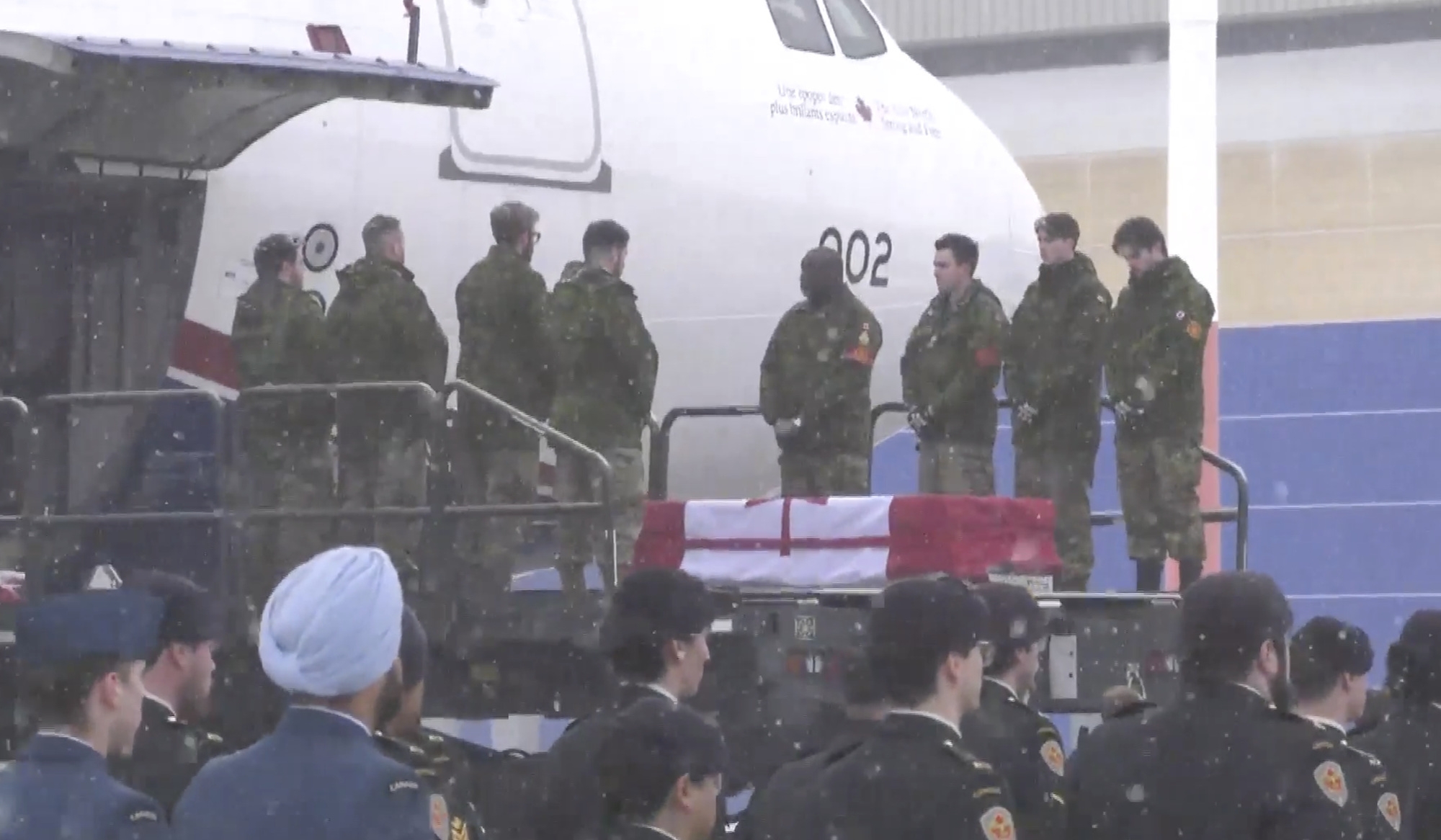  Repatriation ceremony at 8 Wing/Canadian Forces Base (CFB) Trenton on Feb. 3, 2026, for Canadian Armed Forces Gunner Sebastian Halmagean, who died while deployed on Operation Reassurance near Riga, Latvia. Screenshot/Canadian Forces/Facebook